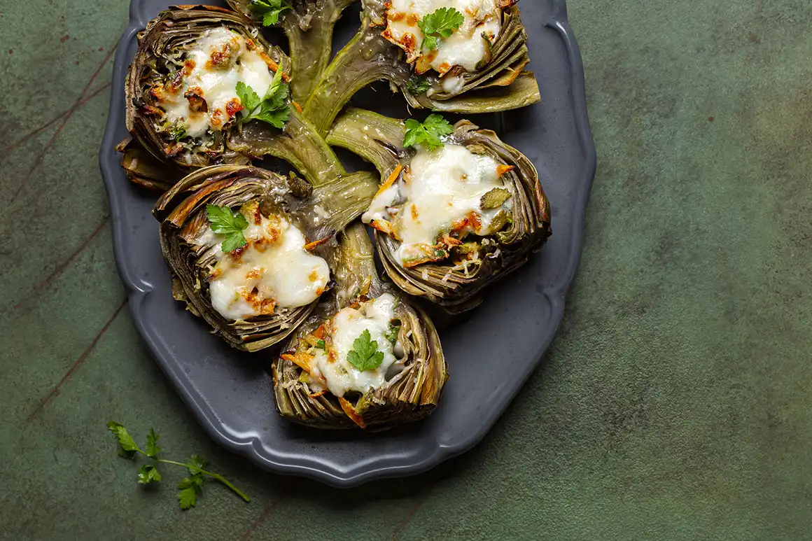 Roasted artichoke hearts with a cheese dip