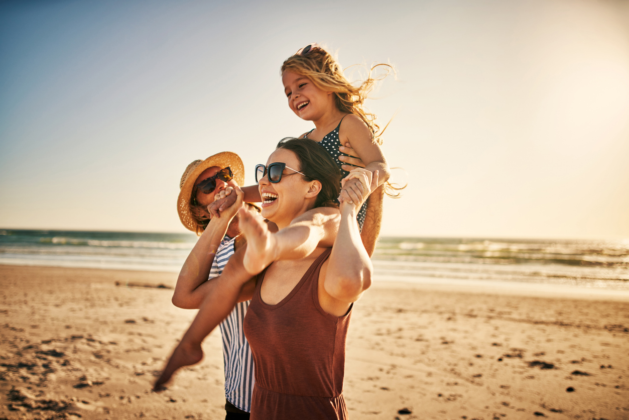 Family spending a day on holiday at the beach